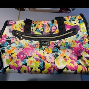 Betsey Johnson 17.5" duffle bag in colorful and vibrant flowers with black
